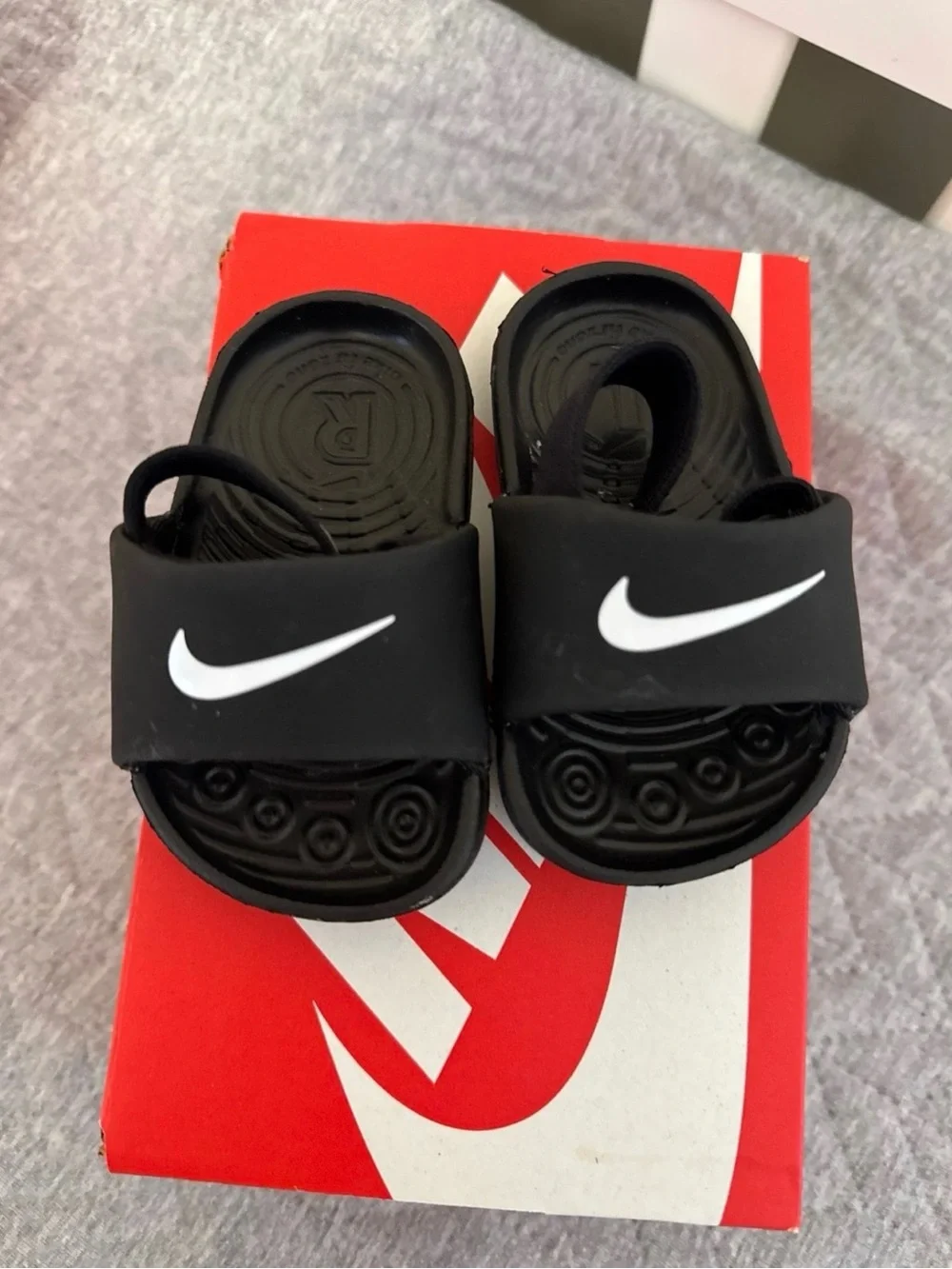 Nike Kids Black Slide Sandals with White Swoosh